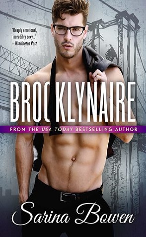 sexy man in glasses with the word brooklynaire across the length of the picture